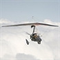 microlight above clouds